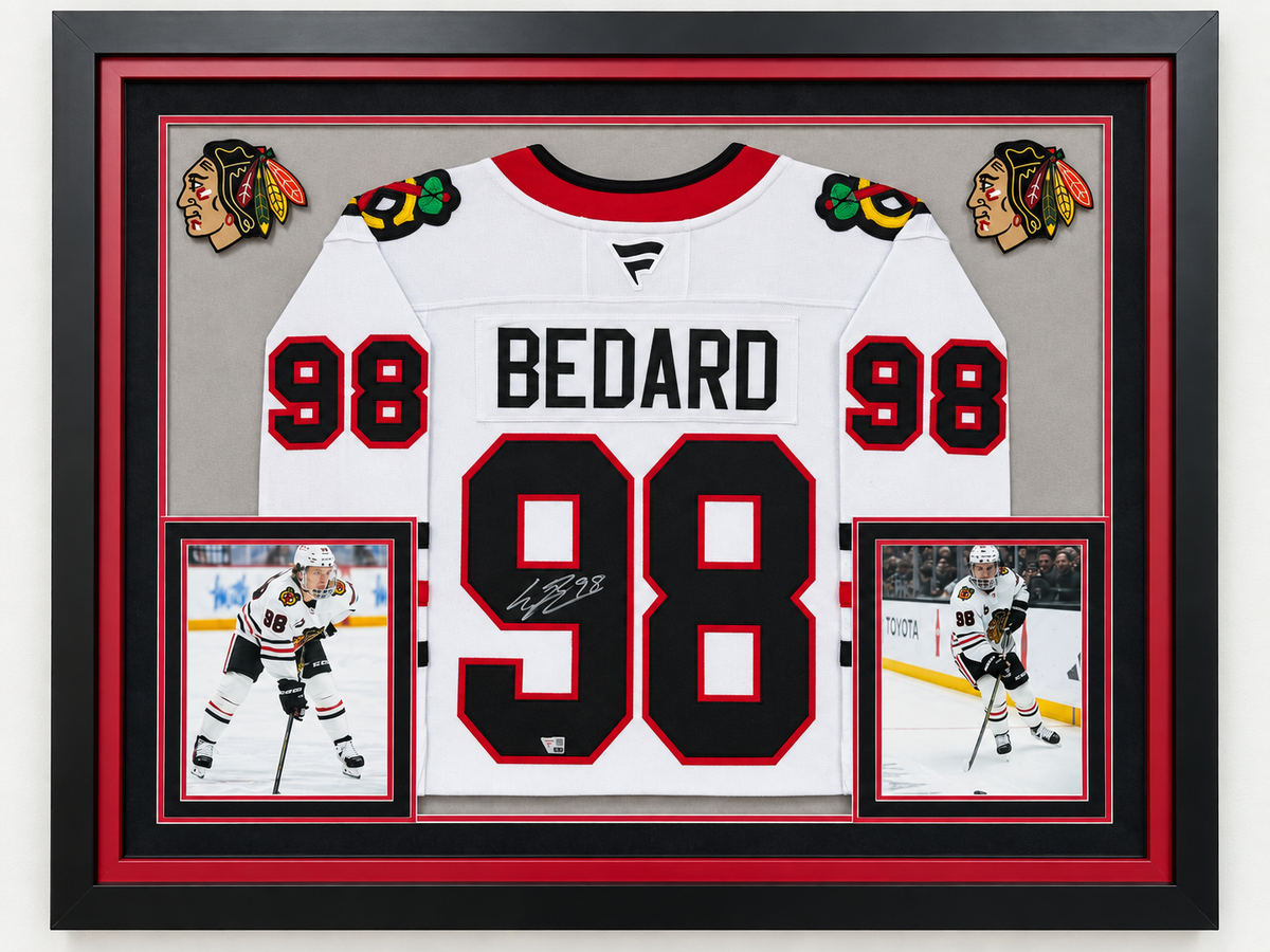 Connor Bedard signed Chicago Blackhawks white No. 98 jersey in the framed display offered by Break Point Cards