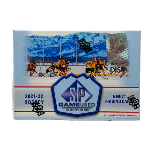 Hockey trading card pack with game-used edition branding on a white background