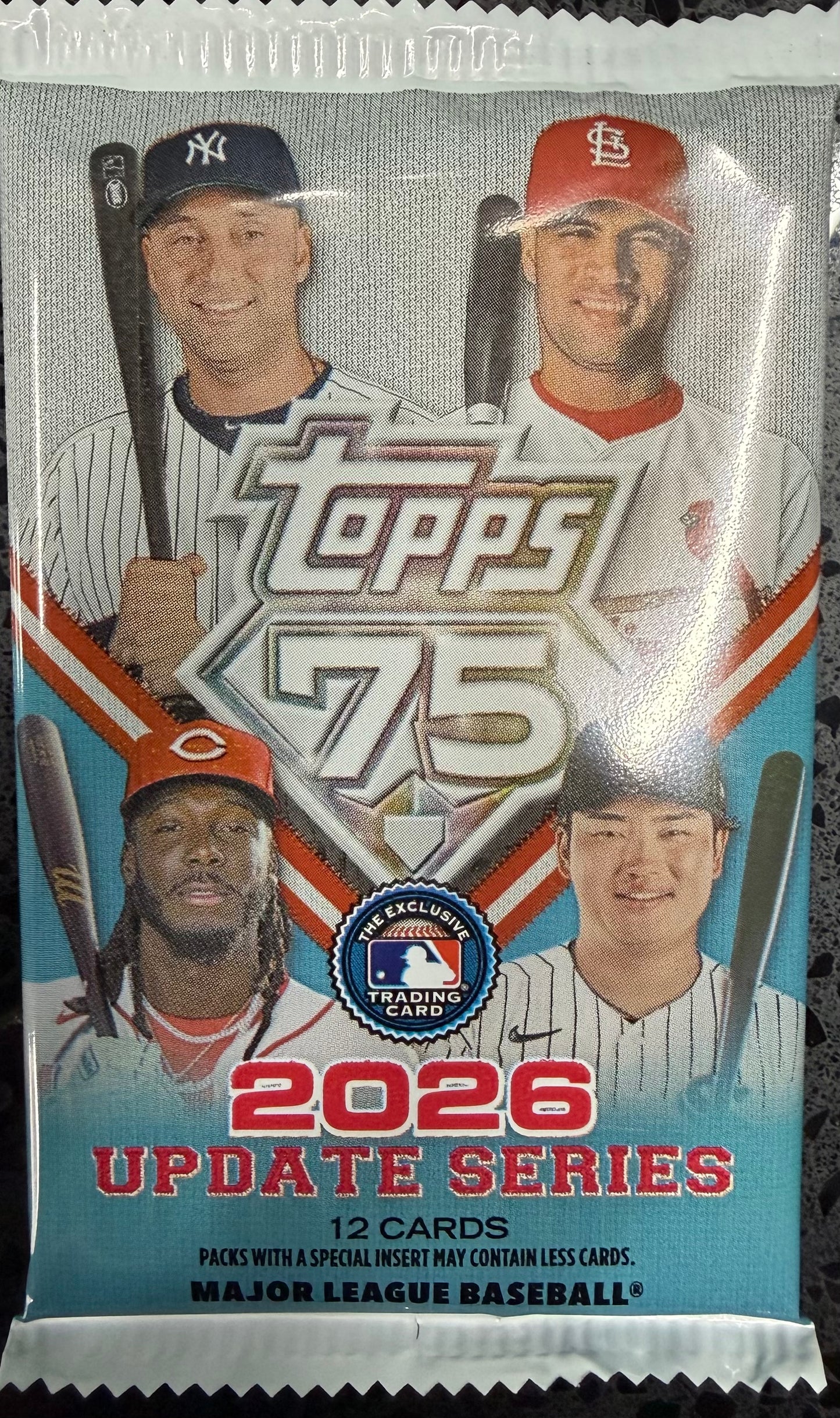 Sealed 2026 Topps Update Series Baseball retail blaster pack, front showing Topps 75th anniversary design and 12 cards